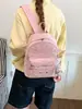 Mochila com estampa de estrelas, grande capacidade, simples e versátil, adequada para estudantes, estilo coreano, com estampas de letras e um visual preppy de faculdade.