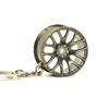 Accesorios de modificación de coche transfronterizos, pequeño regalo para hombre, amortiguador de metal, colgante de neumático, llavero de cubo de rueda al por mayor