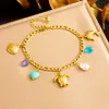 Europa y Estados Unidos creativo transfronterizo colgante de tortuga delfín estrella de mar chapado en oro cadena de acero inoxidable joyería pulsera