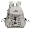Mochila pequeña impermeable ligera estilo japonés para comercio exterior transfronterizo, deportes, modelo nuevo 2026, mochila para mujer para viajes al aire libre y ocio