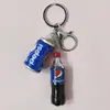 Llavero de Simulation Coke Sprite Transfronterizo Botella de Bebida Fanta Bolso de Pareja Colgante de Coche Pequeño Regalo