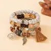 Pulseira de pingente de borla de asa redonda estilo boêmio transfronteiriça europeia e americana, pulseira de contas com cordão elástico multicamadas