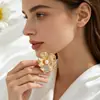 Novo produto criativo e moderno, broche de flor requintado e versátil para mulheres, acessório de xale de luxo leve, atacado