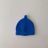 Gorro de lana cálido para bebé estilo coreano ins color liso otoño e invierno para niños y niñas simple versátil gorro para el frío