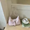 Bolso de axila para el día a día para mujer 2026 Nuevo de verano Tendencia de moda Versátil Súper popular Exquisito Bolso de hombro Bolso cruzado