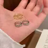 Pendientes Coreanos de Corazón Hueco para Mujer, Exquisitos y Dulces Pendientes Plateados Electrochapados, Pendientes de Lujo Ligero y de Gama Alta, Pendientes al por Mayor