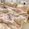 Nuevo modelo 2025 juego de ropa de cama de algodón de cuatro piezas con encaje de algodón, funda de edredón, sábana, juego de ropa de cama de tres piezas para dormitorio