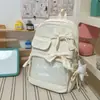 Brisa fresca, suave niebla, mochila con lazo de color azul sal marina de baja saturación para estudiantes de primaria, ligera y cómoda para ir a la escuela