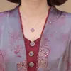 Nuevo vestido estilo chino para madres, corte holgado, longitud media, adecuado para primavera y otoño, diseño nuevo, de manga larga y con un aspecto en capas, diseñado para mujeres de mediana edad y mayores
