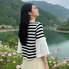 Suministro transfronterizo primavera-verano 2026 nuevo estilo japonés moda camiseta con cuentas y manga de campana, top elegante y lujoso para socialité