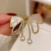 Broche novo estilo feminino senso de alta qualidade nicho broche atacado pino de alta qualidade temperamento fixo roupas terno joia pérola