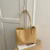 Bolsas de nicho de luxo leve de alta qualidade para mulheres 2026 nova bolsa de ombro única retrô de verão bolsa tote de grande capacidade
