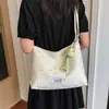 Moda Primavera 2026 Estilo Nicho de Moda Lazo Lunares Bolso de Lona Gran Capacidad Hombro Único de Mano Tote para Mujeres
