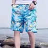 Calças de praia masculinas de verão Shorts Calças masculinas de cinco pontos plus size Calças casuais grandes calças de secagem rápida