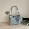 Bolsa de mano de lunares estilo coreano para mujer, nueva moda 2026, bolsa para ir al trabajo, bolso de hombro casual versátil de gran capacidad para la escuela