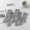 Calcetines de otoño e invierno para niños, calcetines antideslizantes para el hogar, calcetines de color liso negro, blanco, gris a media pantorrilla, calcetines para trampolín, calcetines de algodón para niños mayores y estudiantes