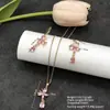 Conjunto de pendientes y collar Xuping estilo vintage de nicho europeo y americano transfronterizo, conjunto de joyería elegante de aleación de cobre, venta al por mayor y hecho a medida
