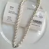 Collar de perlas de plata de ley 925 para mujer, sensación de lujo ligero de nicho de alta gama, estilo de celebridad de internet de moda, collar de perlas Swarovski