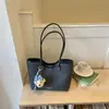 Bolso Tote de Alta Gama Transfronterizo de Nicho para Mujer Verano 2026 Nueva Moda Versátil Simple para Viaje Diario Bolso de Hombro