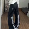 Jeans retro americano con patchwork de salpicaduras de pintura y tres rayas, dobladillo curvo, pantalones anchos holgados unisex, pantalones largos nuevos y elegantes