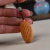 Llavero colgante de maíz de sándalo verde cadena para teléfono móvil sándalo multi-hijo multi-bendición maíz accesorios para coche suministro directo