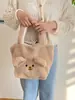 Bolsa de felpa con orejas de oso tridimensionales linda de otoño e invierno, suave y adorable, adecuada para niñas y estudiantes, versátil para el uso diario y las compras