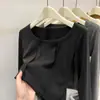 Camiseta térmica de base para mujer con hombros rectos, otoño e invierno 2026, diseño único, top corto de espina de pescado, camiseta de manga larga ajustada