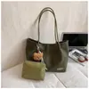 Bolso Retro de Alta Gama para Mujer 2025 Nueva Moda Versátil Bolso de Hombro Gran Capacidad Bolso Tote para Viajar Tendencia Transfronteriza