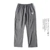 Pantalones casuales deportivos para hombre, estilo montaña, para exteriores, primavera-verano 2026, nuevos, casuales, de secado rápido, cintura elástica, rectos, repelentes al agua