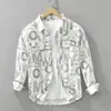 Nueva camisa de manga larga estampada de moda para hombre de primavera y otoño, chaqueta casual versátil artística de corte holgado, blanca