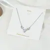 Collar de amor sencillo de estilo japonés y coreano, cadena de clavícula con astas cruzadas, flor, perla y colgante de latido de corazón de celebridad cibernética.