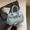 2026 Nova Bolsa Tote Elegante com Padrão de Pedra para Mulheres Versátil de Ombro Único Transversal de Mão Bolsa Simples de Alto Padrão para o Dia a Dia