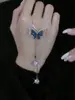 Collar de mariposa con incrustaciones de diamantes para mujer, nuevo modelo verano 2026, accesorio morado de nicho para mujer, alta gama y lujo ligero