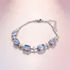 Pulsera de Lujo y Exquisita con Diseño Fresco y Elegante, Incrustada con Circonita, Flor de Cuatro Pétalos, Piedra Lunar Ovalada, Accesorio Versátil para la Mano, Suministro para Regalo