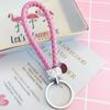 LLavero de cuerda de cuero tejido con diamantes de nueva tendencia, llavero creativo de cuero PU para mujer, llavero de coche, bolso colgante, venta al por mayor
