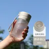 Botella de Agua Deportiva al por Mayor para Exteriores de Gran Capacidad Taza de Plástico Mate Taza de Plástico Transparente Portátil con Correa y Colador de Té