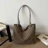 Otoño 2026 Nuevo Estilo Coreano Perezoso Gran Capacidad Estudiante Viajero Versátil Bolso de Hombro Tote Bolso de Mujer al por Mayor