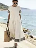 2026 Novo Vestido Listrado de Gola Redonda Solto de Manga Longa Estilo Resort Europeu e Americano para Mulheres Vestido de Praia de Verão