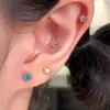 Pendientes de acero de titanio 316L brillantes mini de 4 mm con circonita de estrella para mujer, compactos de pentagrama en espiral para el lóbulo y la concha
