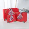 Atacado de Fabricantes Transfronteiriços Itens em Estoque: Bolsas de Personagem da Sorte, Sacolas de Presente Festivas, Sacolas de Papel, Sacolas de Embalagem, Sacolas de Lembrancinha de Aniversário
