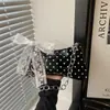 Bolsa de ombro feminina da moda 2026 nova simples estilo coreano doce com bolinhas e corrente, bolsa de alta qualidade para o dia a dia