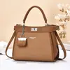 Bolso de Diseño Nicho para Mujer 2025 Nuevo Bolso de Mano de Textura de Alta Gama para Viajes Cotidianos Gran Capacidad Bandolera Cruzada Bolso Gatito
