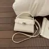 Bolso de Mano de Lujo Ligero Estilo Coreano para Mujer 2026 Primavera Nueva Moda Bolso de Hombro para el Trabajo Bolso Cruzado Elegante de Color Sólido para Mujer