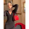 Vestido Suéter de Tricô Gola V Outono Inverno Feminino Manga Longa Cintura Alta Temperamento Retrô Solto Acima do Joelho Simples Emagrecedor