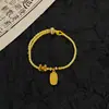 Pulsera tejida de estilo nacional ~ pulsera de mariposa y loto tejida a mano de moda nueva marea nacional china cuerda de mano al por mayor