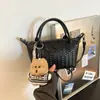 Bolsa de mão transfronteiriça de alta qualidade com textura tecida para mulheres, novo modelo outono 2026, bolsa versátil de ombro e crossbody para o dia a dia