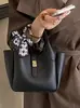 Bolso de mano nuevo Yozzi otoño 2026, bolso cruzado casual de moda, bolso de hombro de estilo coreano moderno, bolso elegante para mujer
