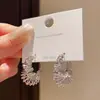 Pendientes Minimalistas Geométricos Plateados con Forma de C Torcida Moda Simple Francesa Nicho de Alta Gama Únicos