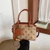 Bolsa de mão retrô de alta qualidade para mulheres 2026 novo estilo bolsa de ombro único para o dia a dia bolsa transversal versátil bolsa concha de grande capacidade