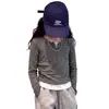 Camiseta de manga larga a rayas estilo coreano de dos piezas falsas para niñas, nueva de otoño 2026, top corto ajustado para looks de moda